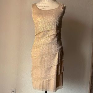 Gold and silver tiered flapper dress.